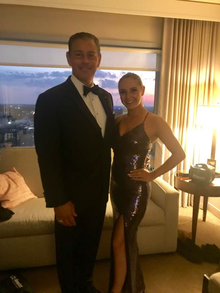 Tony, Natalie, and baby Valentina share a heartwarming moment together, capturing a beautiful family bond.